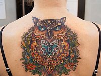 тату сова с замком