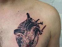 Тату сердце с клюшкой