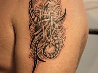 Тату в стиле трайбл узоры