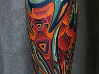 Тату биомех на икре