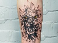Тату лев в графике