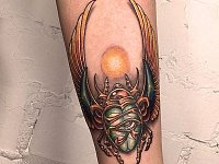 Тату жук скарабей