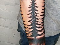 Татуировка лес на предплечье