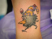 Небольшая тату галчонок