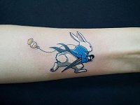 Тату кролик с часами