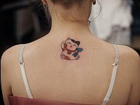Татуировка котик