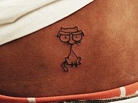 Тату котик на животе