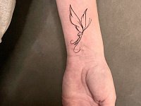 Тату бабочка и буква