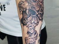 Тату скульптура льва
