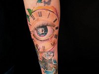 Тату глаз с часами и черепахой