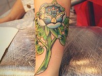 тату голубой цветок