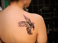 Тату летящая птица