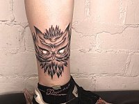 Тату сова на голени