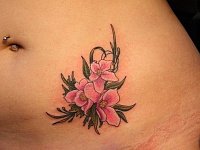 тату цветы на животе