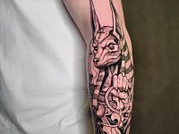 Тату бог Анубис