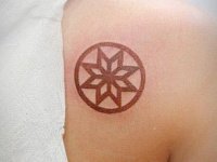 тату снежинка