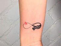 Тату кошка с бесконечностью