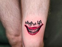 Тату улыбка джокера