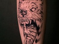 Тату старец в шкуре волка