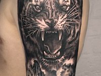 Тату тигр с лесом