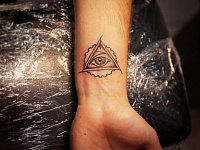 тату глаз в треугольнике