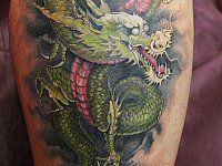 Тату китайский дракон на ноге