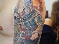 татуировка воин на плече