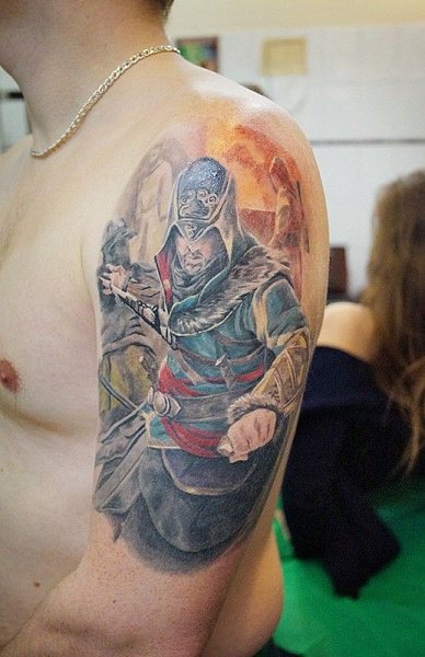 татуировка воин на плече
