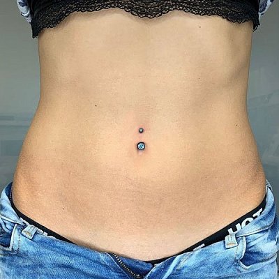 пирсинг пупка женский