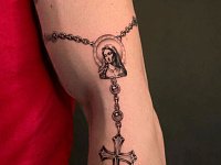 Тату крест и дева мария