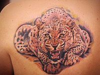Татуировка рычащий леопард