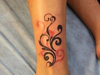 Тату женская узор на щиколотке