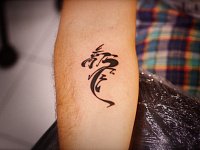 тату дракон силуэт