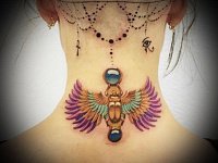 Тату жука скарабея