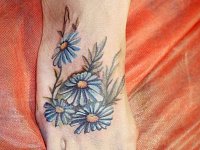 Тату ромашки