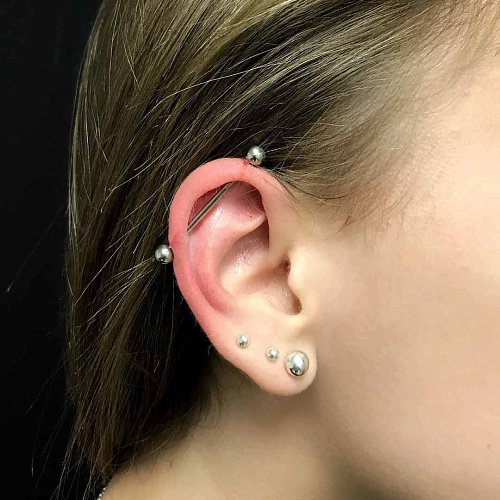 Сделать Пирсинг ушей в Москве в салоне ТАТУмания