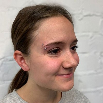 Пирсинг брови для девушек