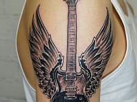 Тату гитара с крыльями