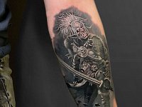 Тату Орк с мечом