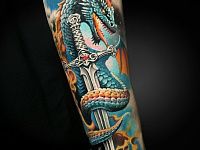 Тату дракон и меч