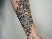 Тату механизм на руке