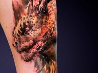 Татуировка дракон на ноге