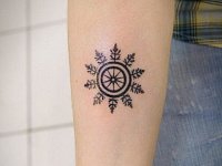 татуировка снежинка