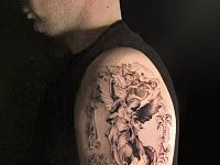 Тату архангел Михаил и демон