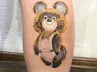 Тату олимпийский мишка