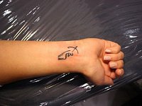 Тату стрелец на запястье