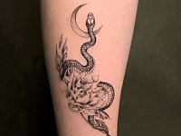 Тату змея и цветок