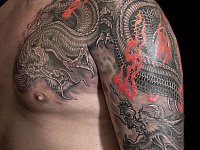 Тату два дракона