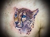 Тату леопард на груди