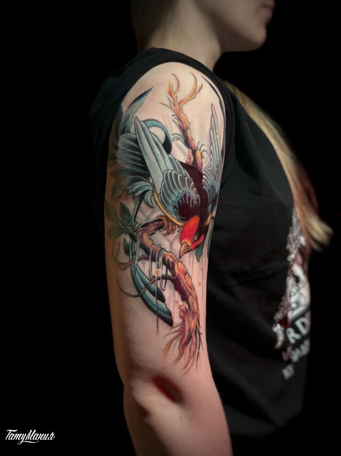 Татуировка птица на ветке